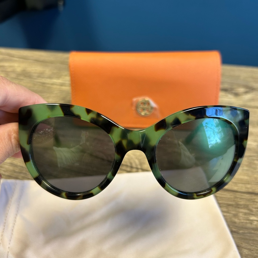 Tory Burch sunglasses.